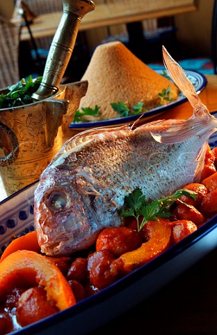 Moroccan fish dish with couscous