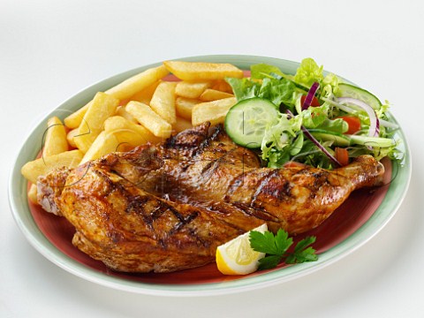 Chicken and chips with salad