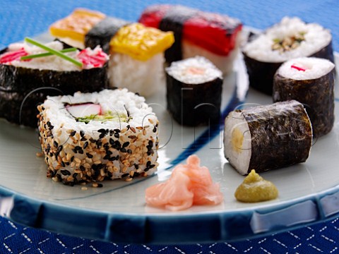 Japanese maki sushi and nigiri sushi with ginger and wasabi