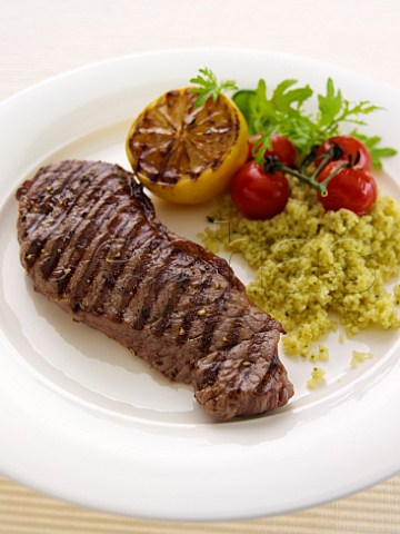 Grilled sirloin steak with couscous
