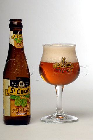 Bottle and glass of St Louis Gueuze lambic beer from Brouwerij Van Honsebrouck