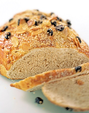 Fruit and nut coated white bread