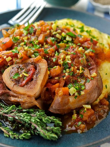 Plate of Osso Bucco with gremolata and polenta