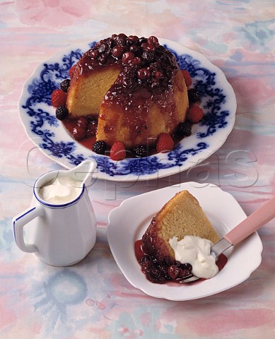 Mixed berry sponge pudding and cream