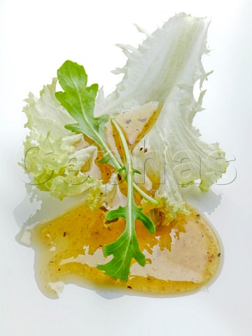 Lettuce leaf rocket and salad dressing