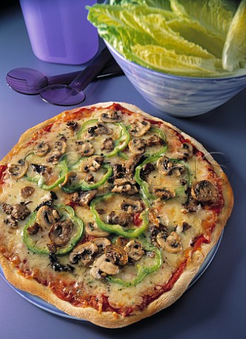 Mushroom pizza with endive side salad