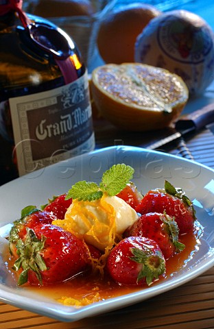 Strawberries with icecream and Grand Marnier syrup