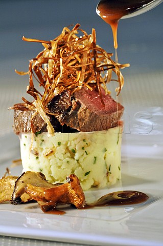 Champ fillet steak and roasted onion stack