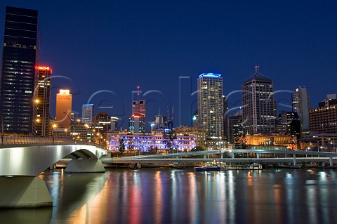 City skyline and Victoria Bridge at dusk from Southbank Brisbane Queensland Australia