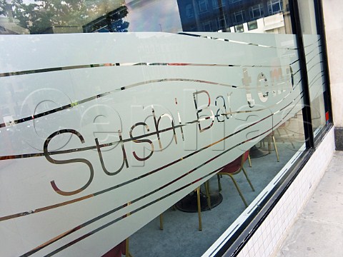Window sign for Japanese sushi bar in London
