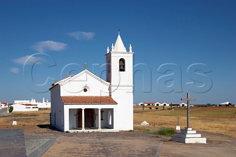 The church of the relocated village of Luz the original site was flooded by the Alqueva dam the largest artificial lake in Europe Luz Alentejo Portugal