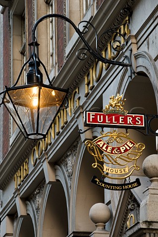 Fullers sign advertising Ale and Pie outside the Counting House Pub Cornhill City of London