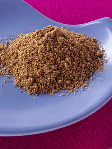 Dish of ground coriander spice