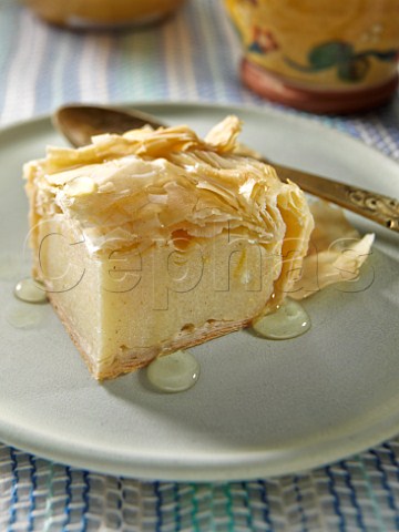 Greek milk pie with lemon and cinnamon syrup