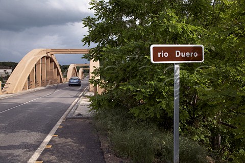 Ro Duero sign by bridge over the river at Peafiel Castilla y Len Spain  Ribera del Duero