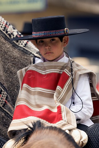 Young Huaso on horseback for the 18th September Independence Day celebration Santa Cruz Chile
