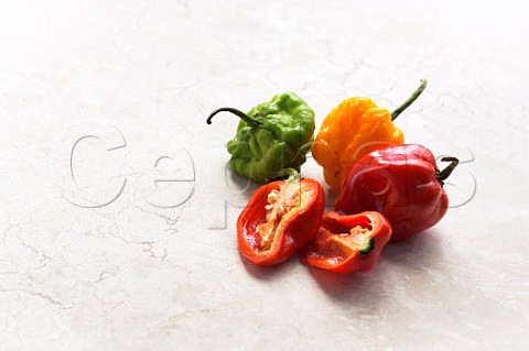 Assorted chillies capsicum with one cut open