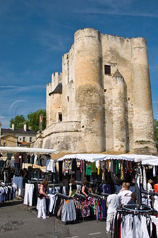Openair market surrounding the Medieval donjon in the centre of Niort DeuxSvres France