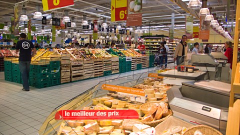 Cheese and fresh produce section in a French supermarket La Rochelle CharenteMaritime France