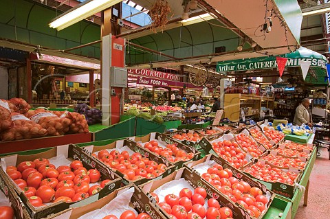 Tomatoes on sale at the Indoor food and produce market Little Italy The Bronx New York USA