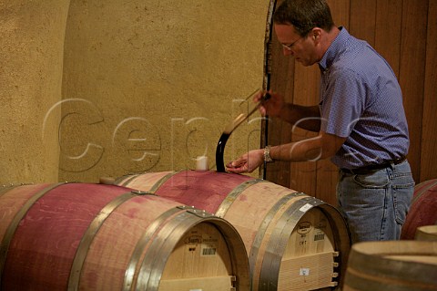 Ted Davidson of Spring Mountain Vineyard barrel tasting cabernet wine 2007 vintage