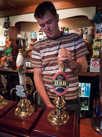 Barman pulling a pint of HSB beer at the Forest Inn Ashurst Hampshire