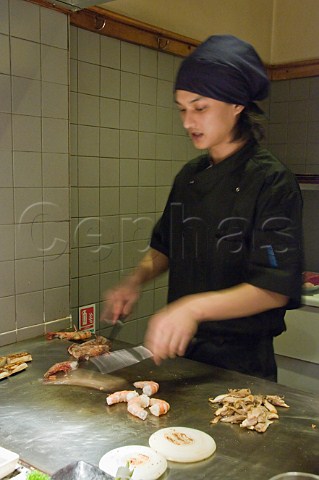 Cooking king prawns at Miyama Japanese restaurant City of London