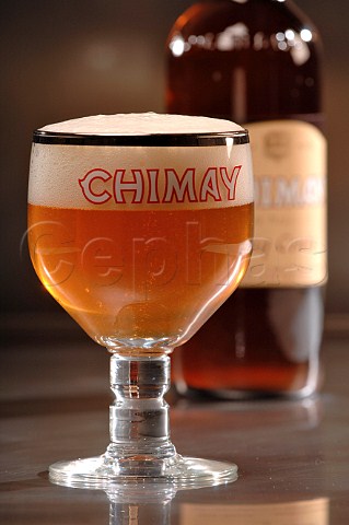 Glass and bottle of Chimay Capsule Blanch  Trappist Belgian beer
