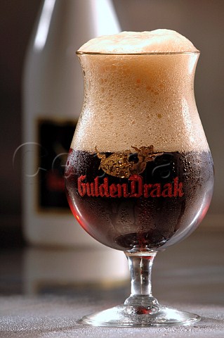 Glass of Gulden Draak Belgian beer