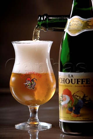 Pouring glass of La Chouffe Belgian beer