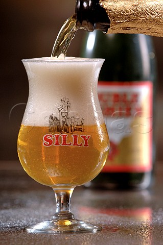 Pouring glass of Silly Belgian beer