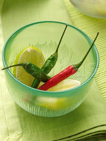 Chillies and lime slices