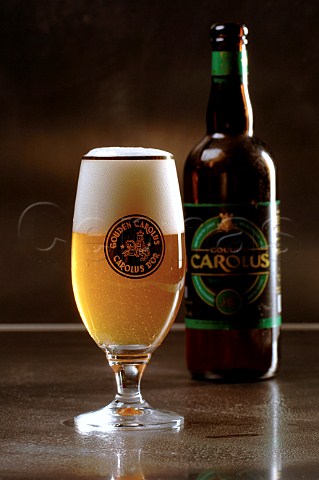 Glass and bottle of Gouden Carolus Belgian beer