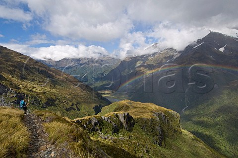 Hiker on French Ridge track Mt Aspiring National Park South Island New Zealand