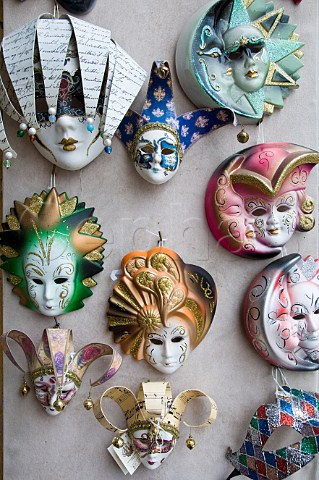 Face masks outside a souvenier shop window Murano Venice Italy
