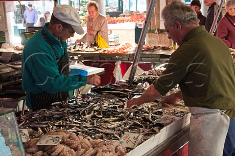 Seafood stall at the Peschera Rialto fish market San Polo Venice Italy