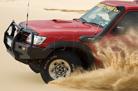Nissan Patrol on sand dune at Stockton Beach Newcastle New South Wales Australia