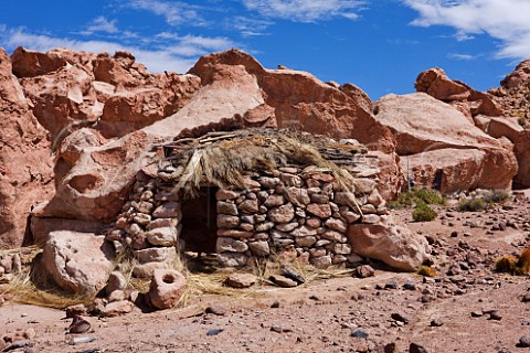 Shepherds shelter built from local rock near the village of Machuca at over 4000 metres altitude in the Atacama Desert Chile