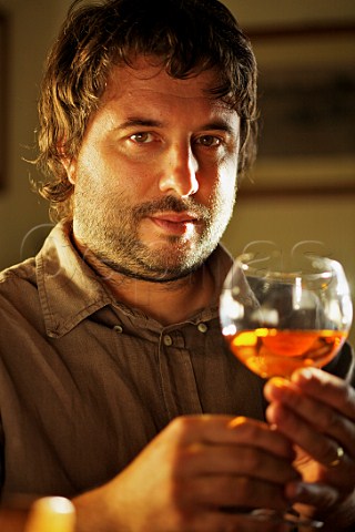 Aleks Klinec with a glass of his Rebula in his winery at Medana near Dobrovo  Slovenia   Brda
