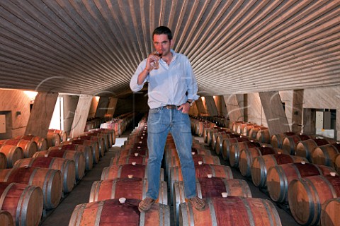 German Lyon winemaker in the barrel cellar of Prez Cruz Maipo Alto Chile  Maipo Valley