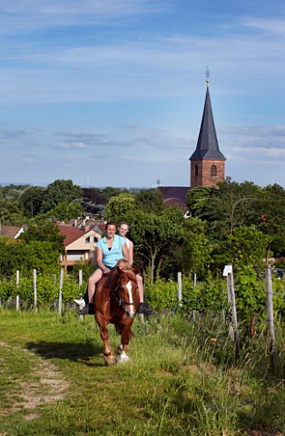 Girls on horseback by the Kirchenstck vineyard of Dr Brklin Wolf  Forst an der Weinstrasse Pfalz Germany