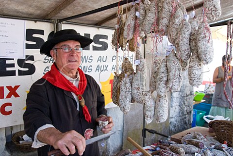 Saucisson seller in the market at Amboise IndreetLoire France