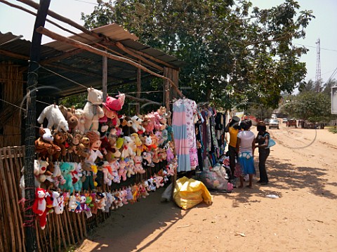 Roadside stall selling childrens soft toys and womens clothes Ponta do Ouro southern Mozambique