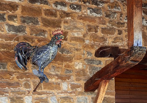 Cockerel on wall of the Abbaye de Genne the winery of Frdric Lornet MontignylsArsures Jura France Arbois