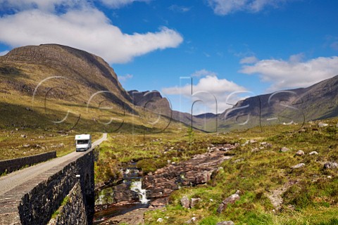 Motor caravan descending the road from Bealach Na Ba  Applecross Peninsula Ross and Cromarty Scotland