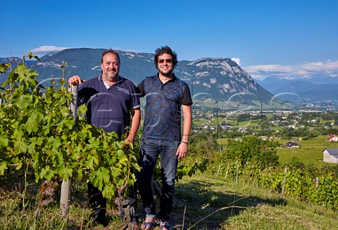 JeanClaude Masson and son Nicolas with 100year old Jacqure vines which are used for his cuve Centenaire Domaine Jean Masson Apremont Savoie France  Apremont