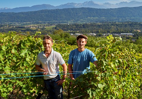 Daniel Genoux with his son Pierre in vineyard of Domaine Genoux Chteau de Mrande Arbin Savoie France