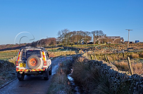 Land Rover on a lane near ChapelenleFrith  Peak District National Park Derbyshire England