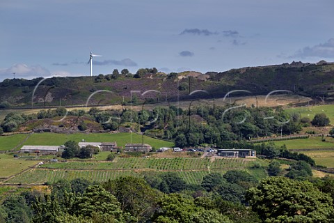 Holmfirth Vineyard and its winery visitor centre and restaurant viewed from across the Holme Valley Holmbridge West Yorkshire England
