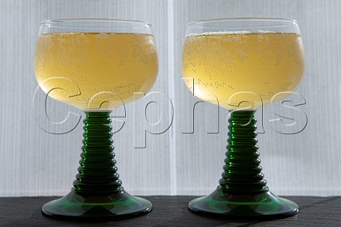 Pair of traditional Mosel wine glasses containing Federweisser
